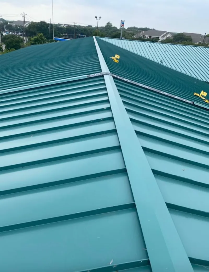 Green commercial metal roof ridge and valley for Metal Roof Repair in Chelsea